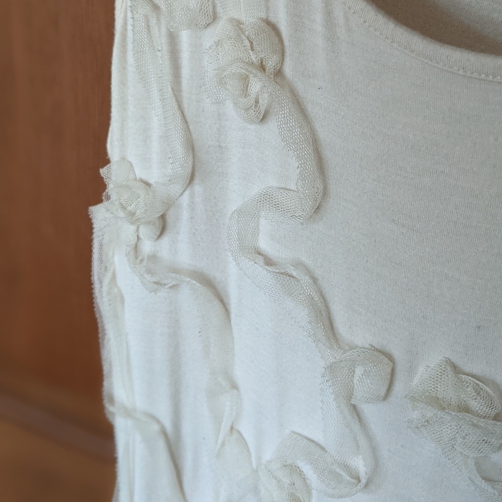 Ivory tank with organza detail